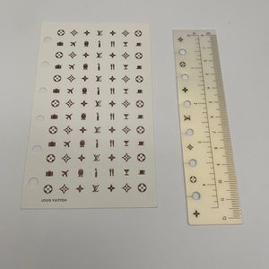 Authentic Louis Vuitton ruler and sticker PM size